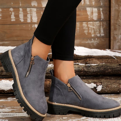 Homixa women's chunky platform booties in animal print with side zip, cushioned insole, and rugged lug sole.