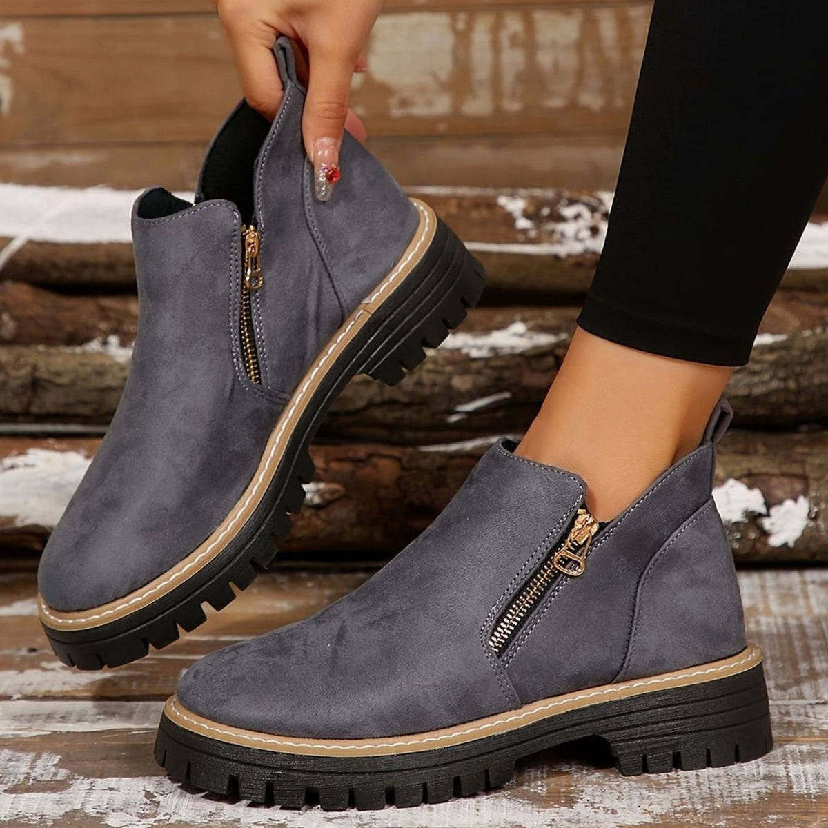 Animal print women's chunky platform booties by Homixa with side zip, cushioned insole, and rugged lug sole.