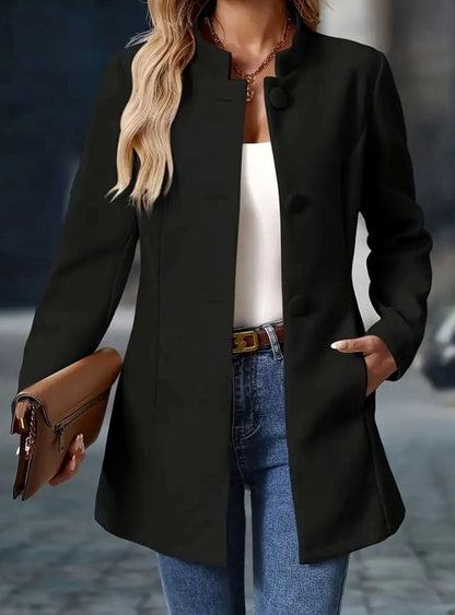 Woman wearing Homixa women's classic button-front winter coat with stand collar and side pockets, stylish and warm outerwear.