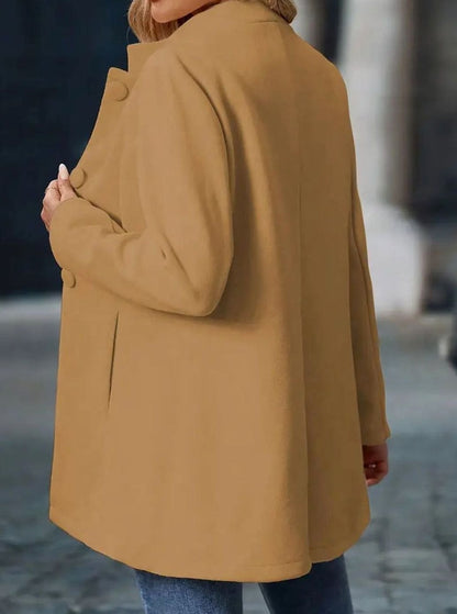 Women's Homixa classic button-front winter coat with stand collar and side pockets, perfect for cold weather.
