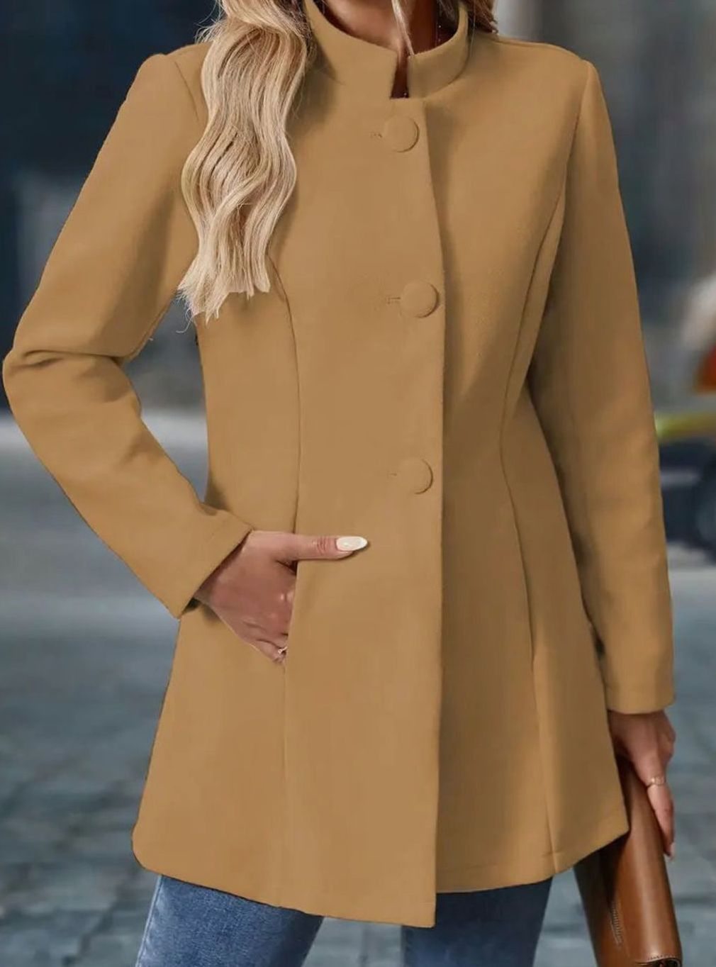 Women's Homixa winter coat with classic button-front design, stand collar, and side pockets for cozy winter style.