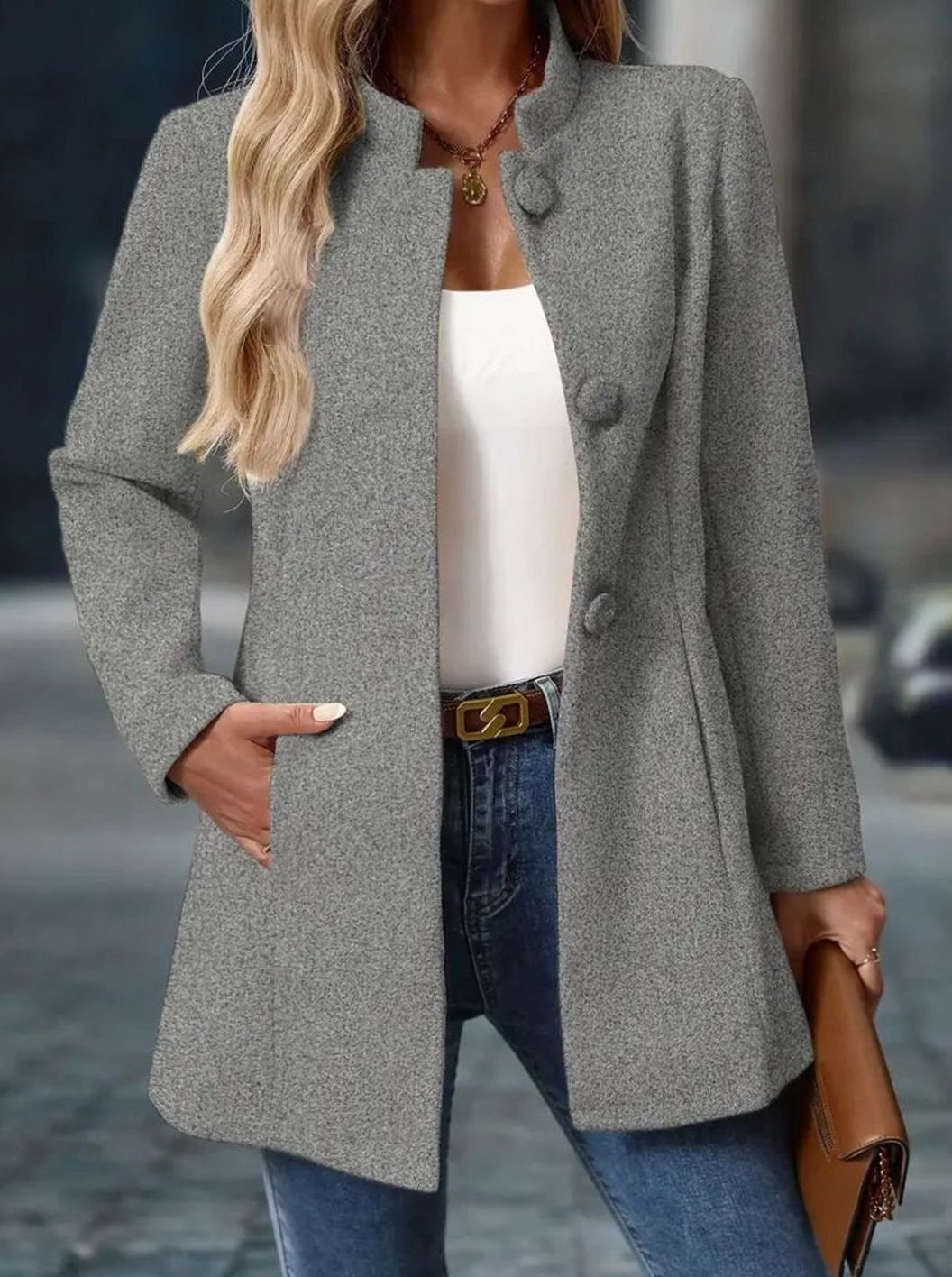Women's Homixa winter coat with button-front, stand collar, and side pockets, stylish for cold weather.