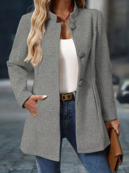 Women's Homixa winter coat with button-front, stand collar, and side pockets, stylish for cold weather.