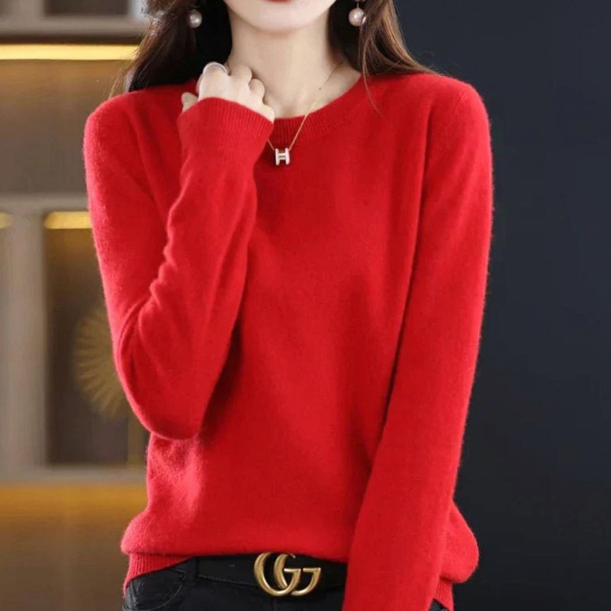 Women’s classic long-sleeve crew-neck knit sweater by Homixa with a soft, cashmere-like feel, shown in a cozy, fitted style.
