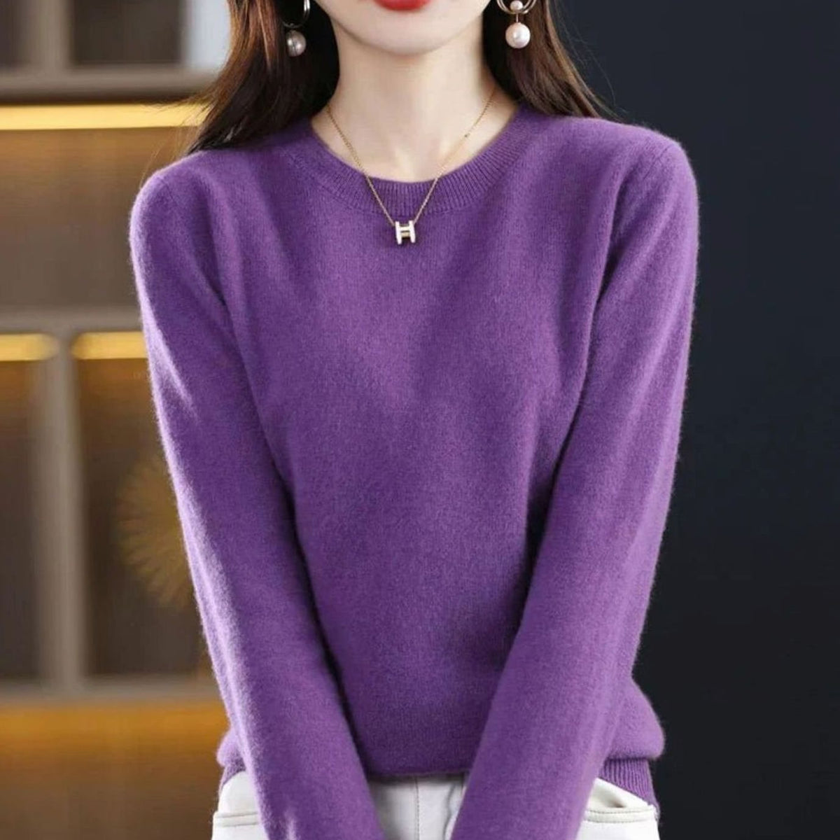 Homixa women's long-sleeve crew-neck knit sweater with a soft, cashmere-like feel, featuring a classic design and ribbed cuffs.
