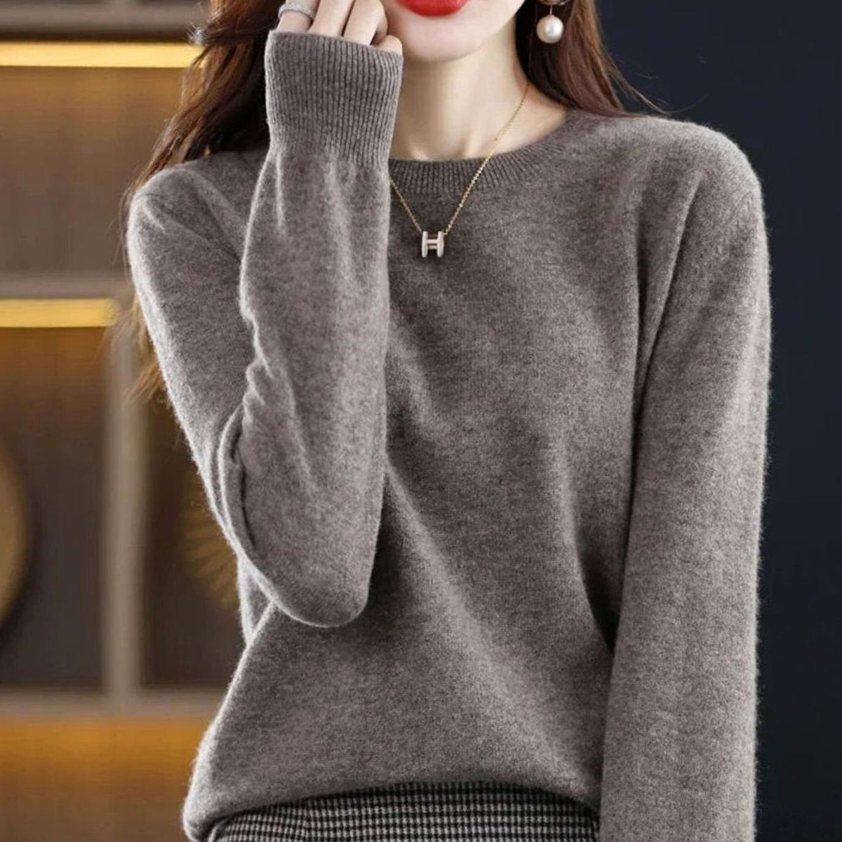 Women's long-sleeve crew-neck knit sweater by Homixa with a soft, cashmere-like feel, perfect for cozy, casual wear.