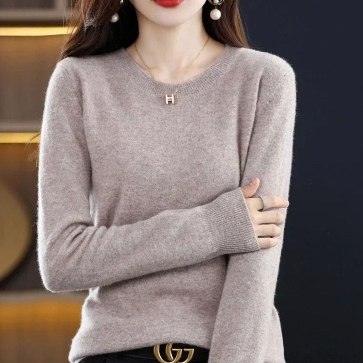 Women's Homixa long-sleeve crew-neck knit sweater with a cashmere-like feel, showcasing soft, cozy fabric and classic style.