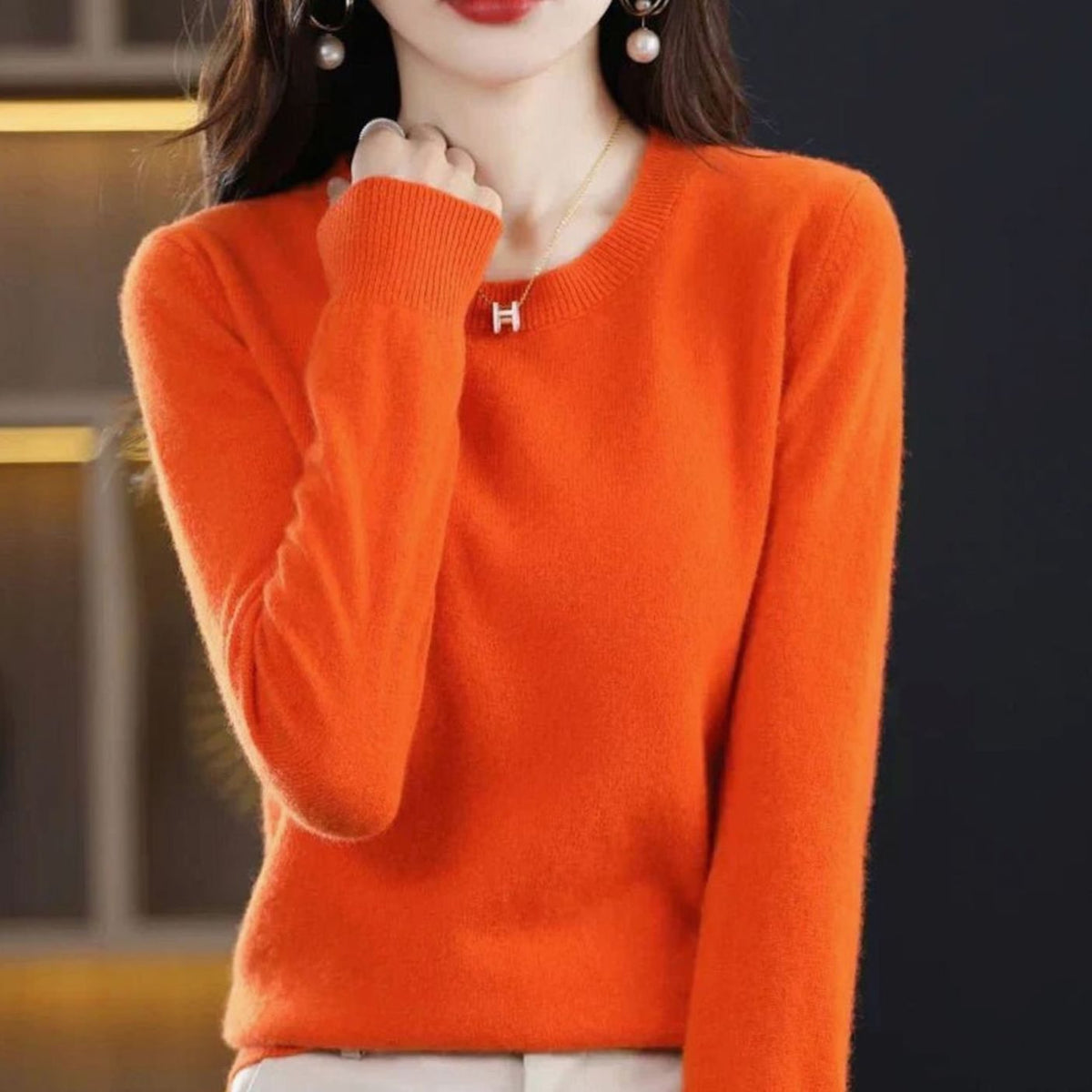 Women's Homixa long-sleeve crew-neck knit sweater with a soft, cashmere-like feel, featuring a classic design and comfortable fit.