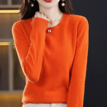 Women's Homixa long-sleeve crew-neck knit sweater with a soft, cashmere-like feel, featuring a classic design and comfortable fit.