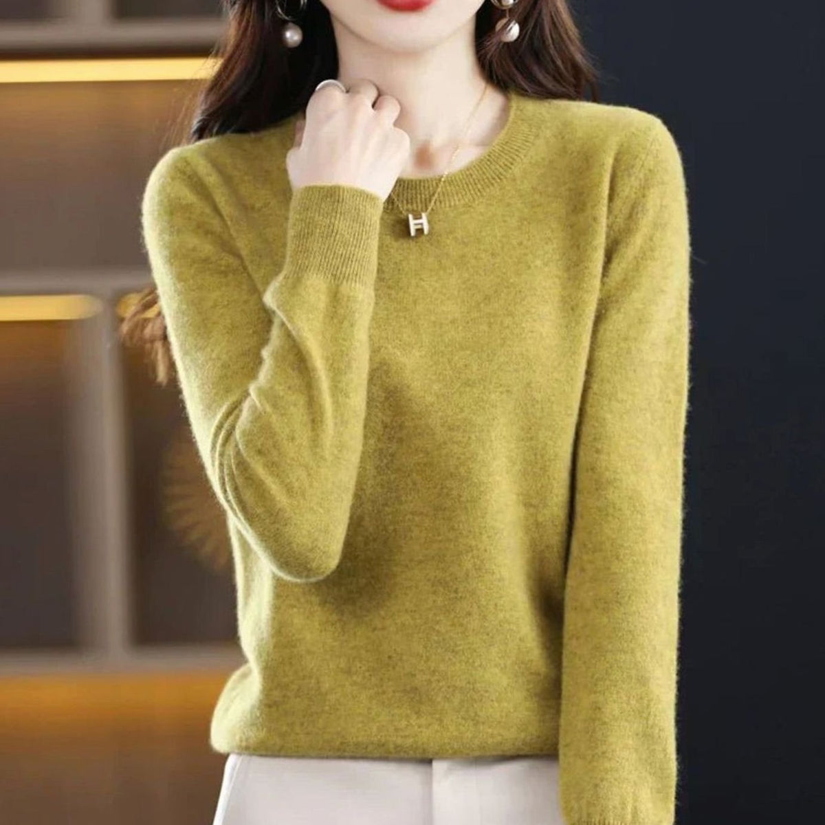 Women's Homixa long-sleeve crew-neck knit sweater with a soft, cashmere-like feel, perfect for cozy casual wear.