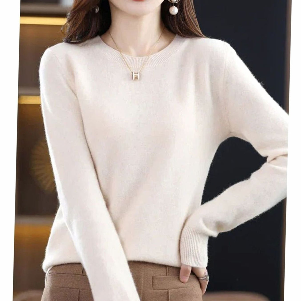 Women’s Homixa long-sleeve crew-neck knit sweater with a soft, cashmere-like feel, perfect for casual and cozy winter outfits.