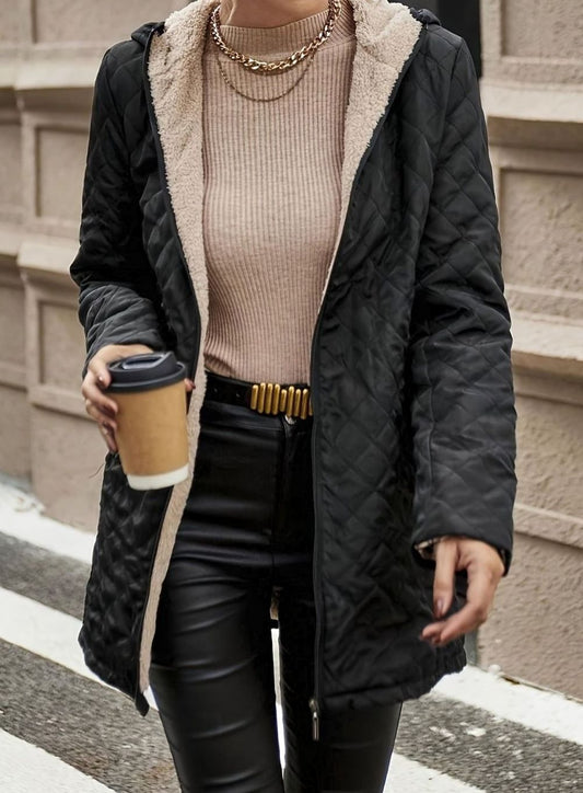 Women's quilted puffer winter jacket by Homixa featuring fleece lining and mid-length design for warmth and comfort.