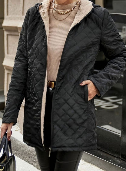 Women's mid-length quilted puffer winter jacket by Homixa with fleece lining, featuring a cozy, warm winter outerwear design.