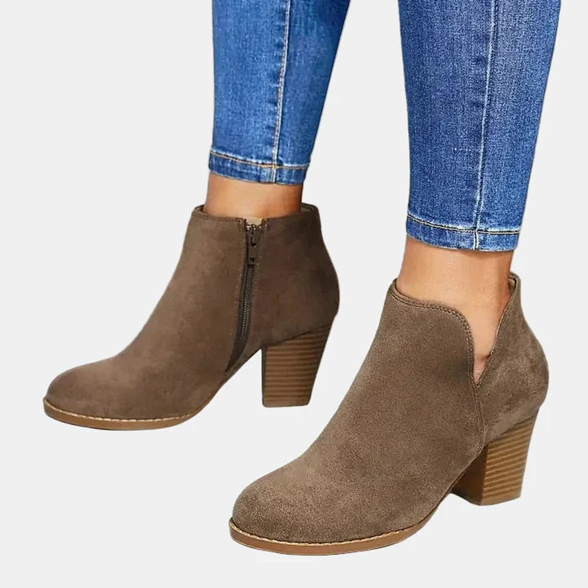 Women's comfortable suede-look block heel booties with side zip and lined insole by Homixa, showing the stylish footwear from the side.