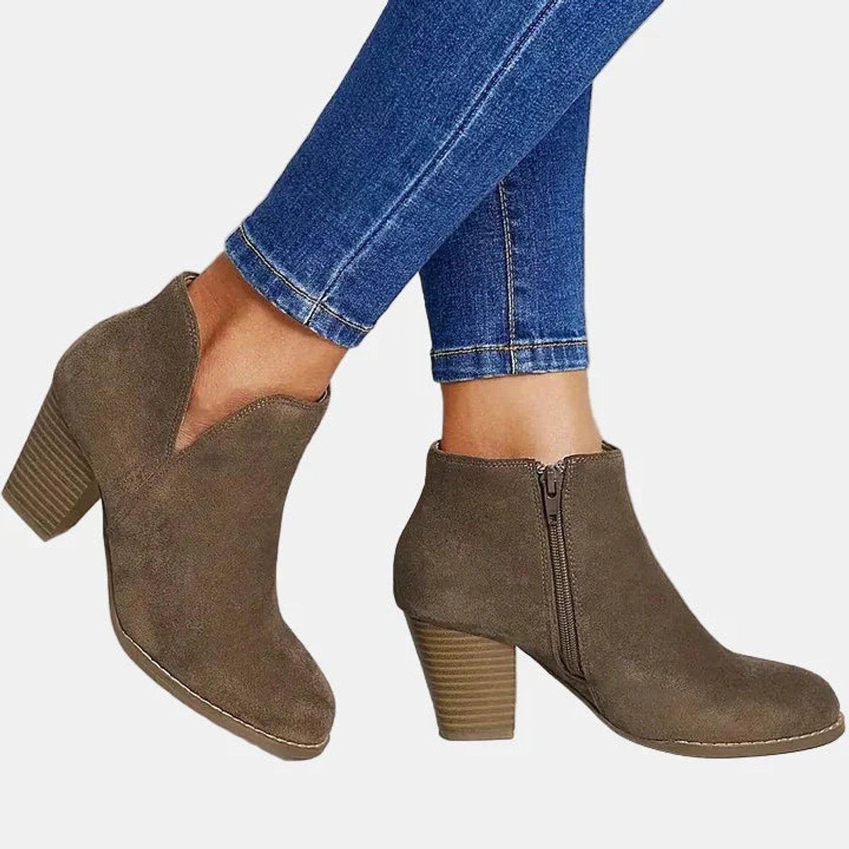 Women's suede-look block heel booties by Homixa with side zipper and lined insole, stylish and comfortable for everyday wear.