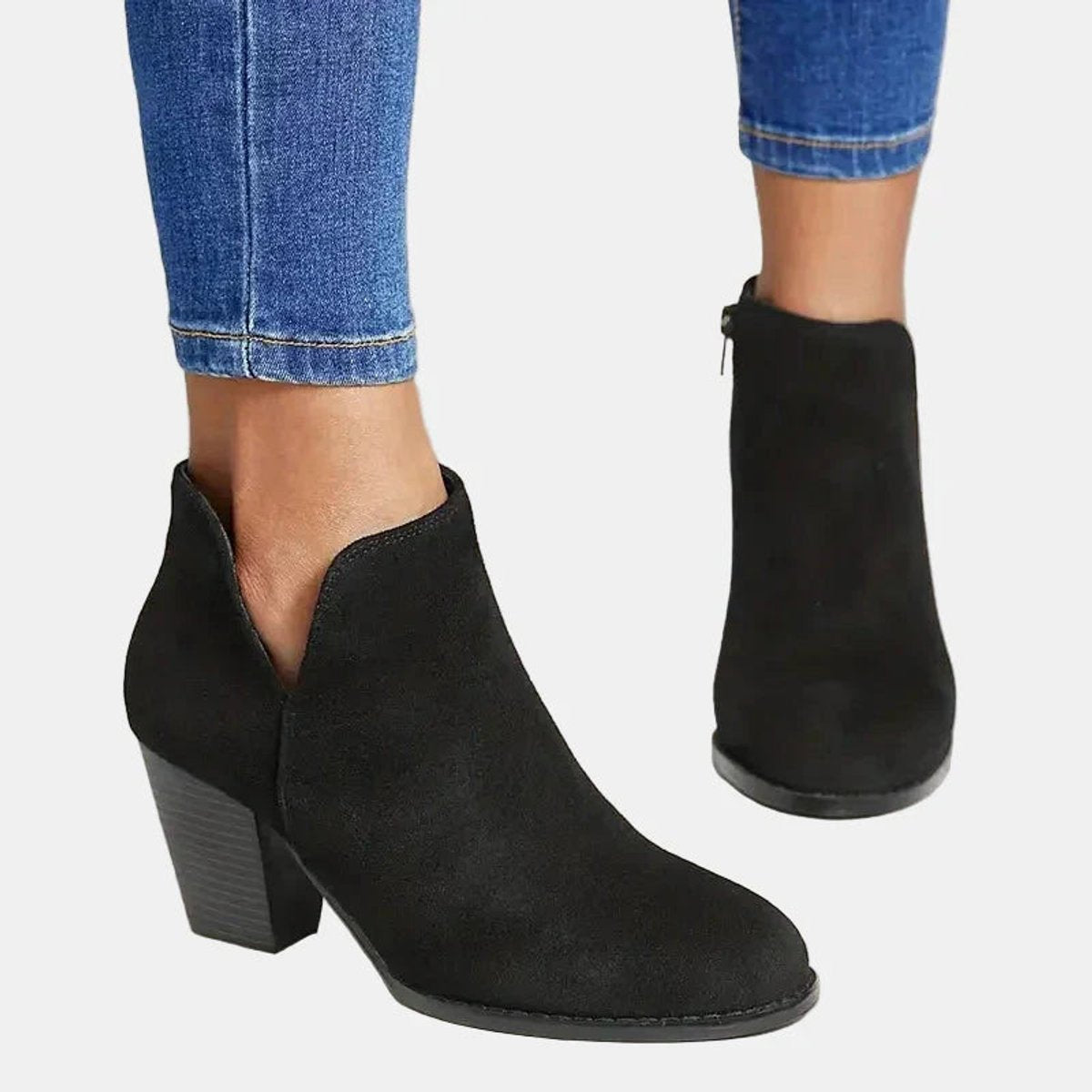 Women's suede-look block heel booties by Homixa featuring side zip and lined insole, stylish and comfortable for everyday wear.