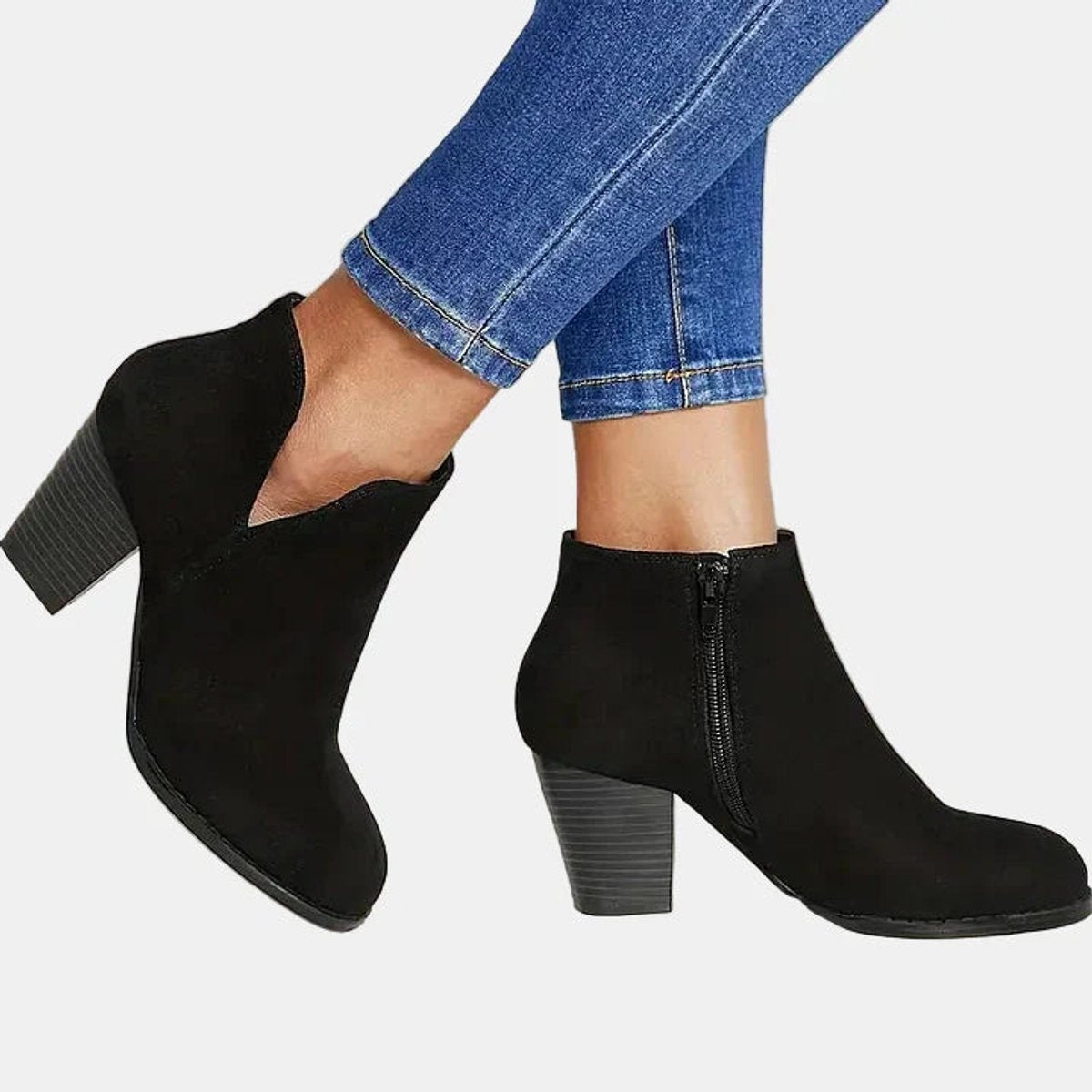 Women's suede-look block heel booties by Homixa featuring side zip and lined insole for comfort.