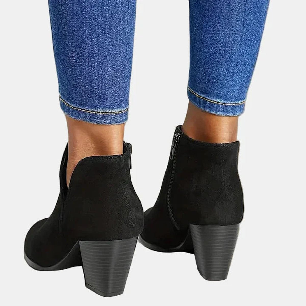 Women’s suede-look block heel booties by Homixa with side zipper and lined insole, stylish and comfortable for everyday wear.