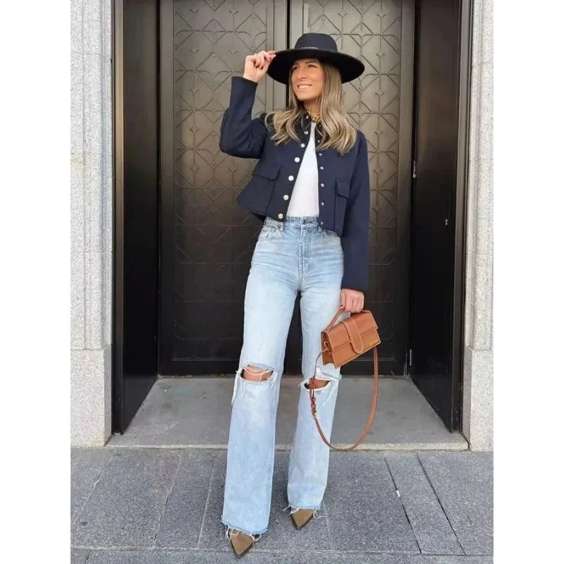 Women's Cropped winter bomber jacket by Homixa with button front and structured, clean design, perfect for cold weather style.