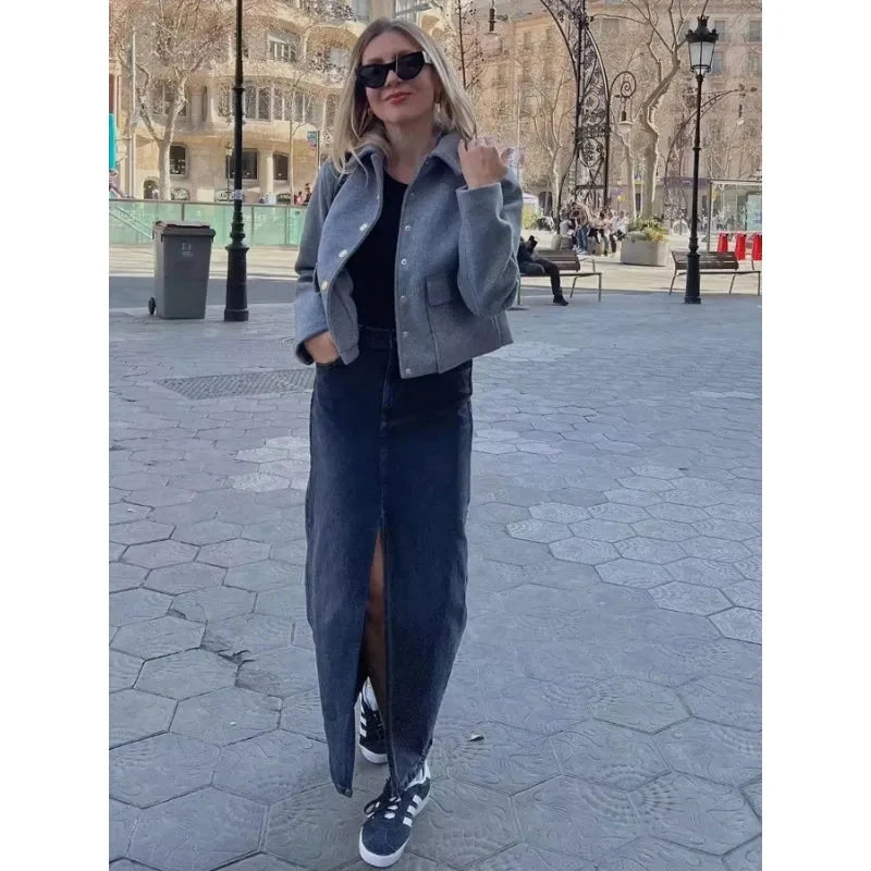 Women's cropped winter bomber jacket by Homixa featuring a button-front design and a clean, structured shape.