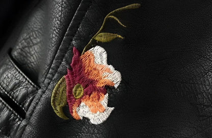 Women's faux-leather cropped moto jacket by Homixa with floral embroidery and metal studs, featuring a stylish biker jacket design.