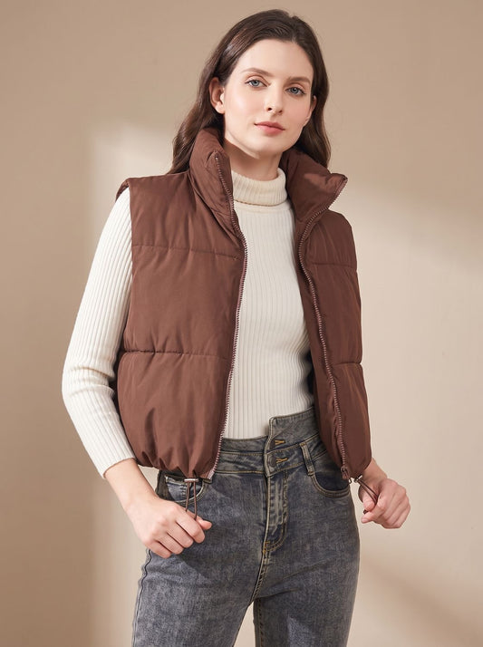 Women's lightweight cropped puffer vest by Homixa with stand collar and two-way zipper, shown on a model.