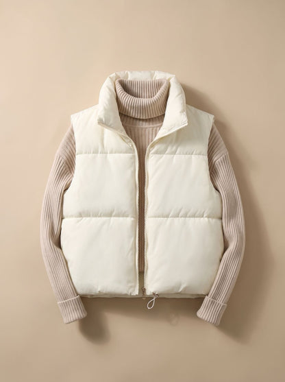 Women's lightweight cropped puffer vest with stand collar and two-way zipper by Homixa, shown in a stylish, fitted design.
