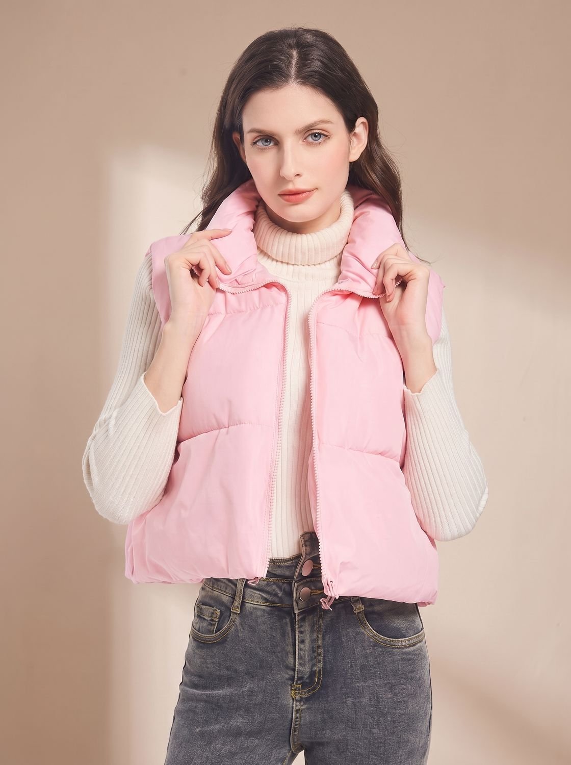Women's lightweight cropped puffer vest with stand collar and two-way zipper by Homixa, shown on a mannequin.