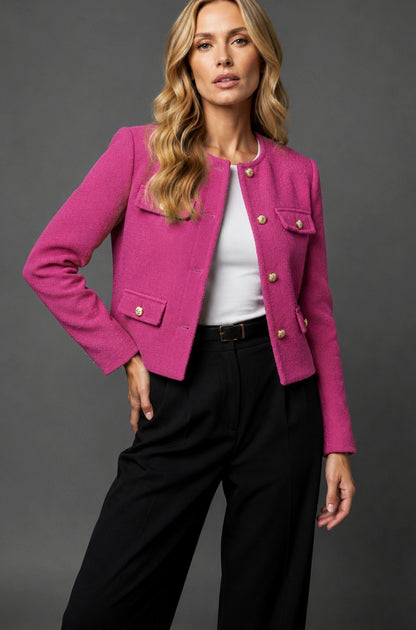 Women's cropped tweed blazer jacket by Homixa featuring gold buttons and flap pockets, styled on a model.