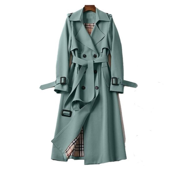 Women’s double-breasted trench coat by Homixa featuring a belt, buckled cuffs, and plaid lining, worn over a casual outfit.