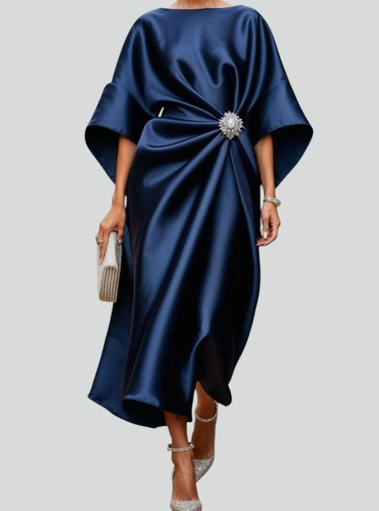 Women's satin midi dress with draped design, batwing sleeves, and brooch detail by Homixa.