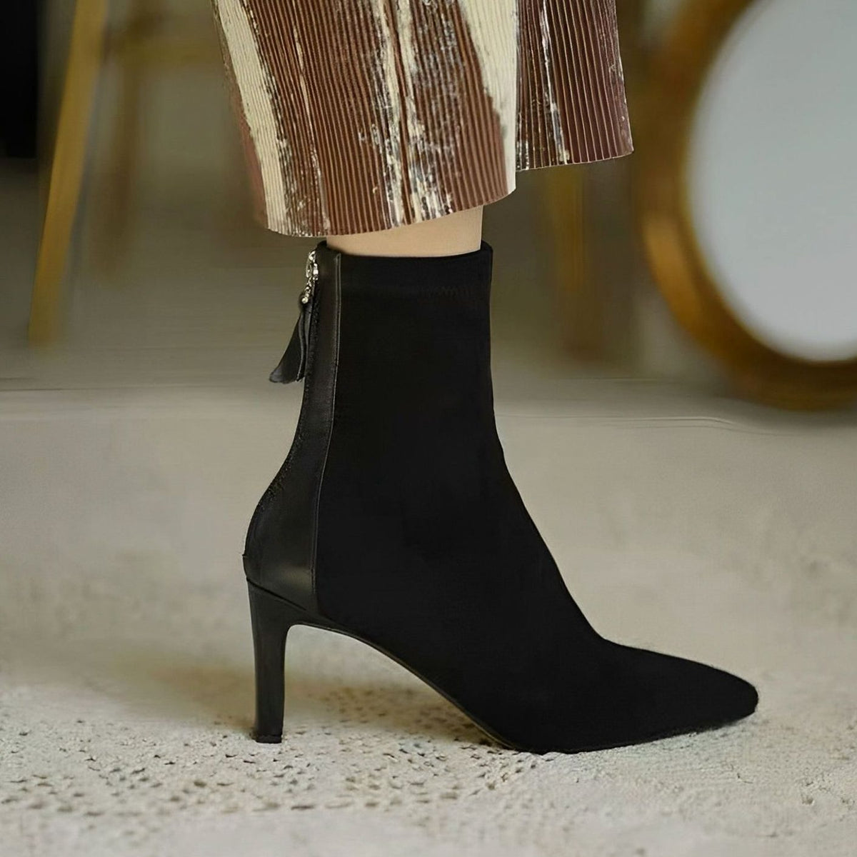 Elegant Homixa women's stiletto-heel ankle boots with stretch shaft and rear-zip closure, showcased on a clean white background.