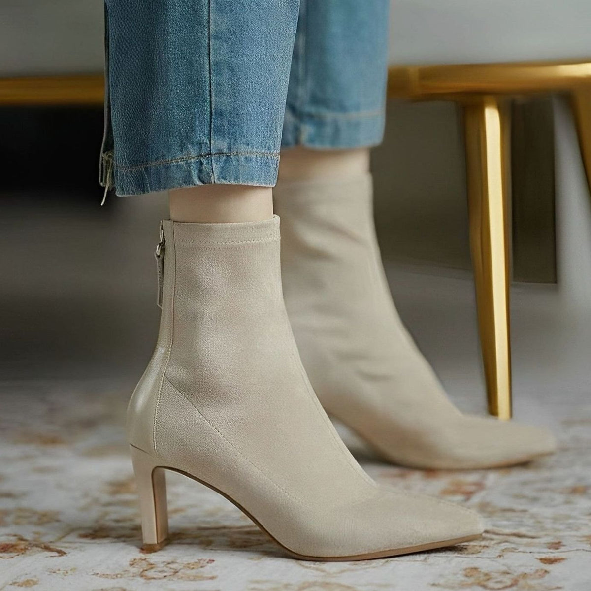 Elegant Homixa women's stiletto ankle boots with stretch shaft, rear-zip closure, and sleek heel on a clean background.