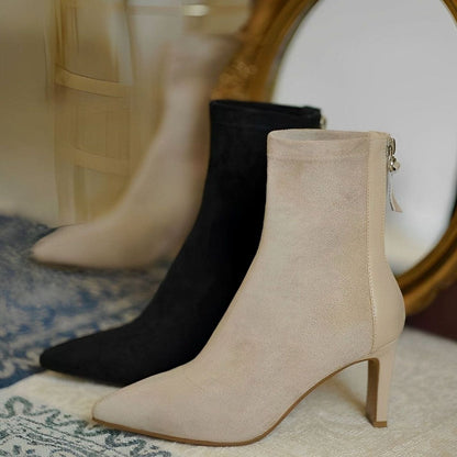 Elegant Homixa women's stiletto-heel ankle boots with stretch shaft and rear-zip closure, showcasing sleek design and stylish silhouette.