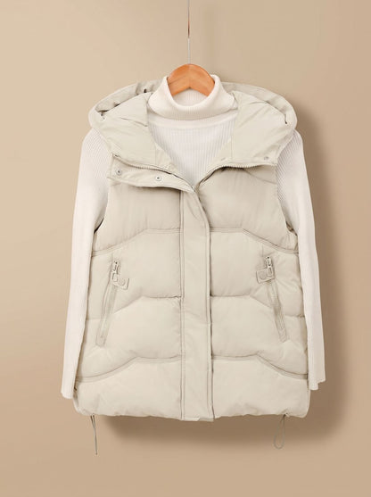 Women's Homixa padded hooded puffer vest with zipper pockets, featuring quilted design and warm winter fall outerwear.