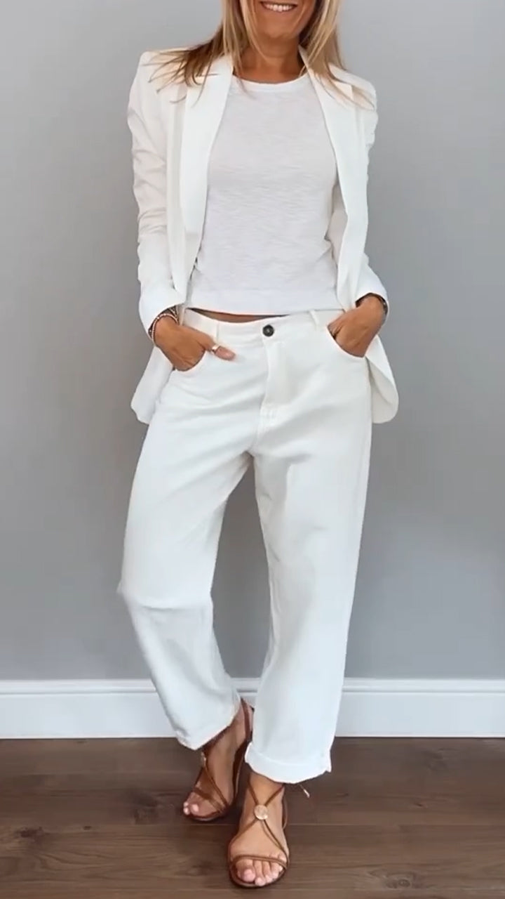 Relaxed-fit women's fall-to-winter two-piece set with blazer and pants by Homixa, shown on a model.