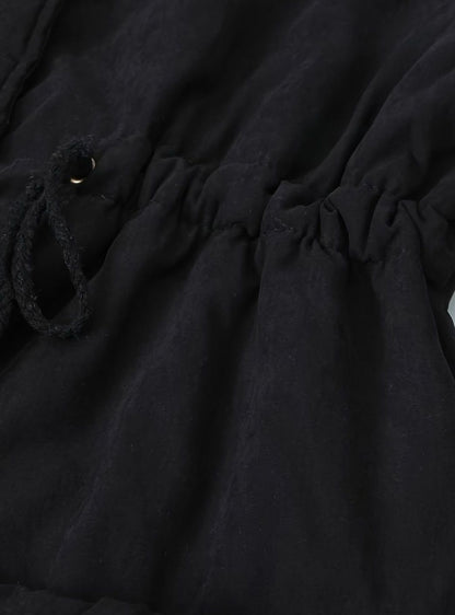 Women's Homixa winter parka with faux-fur collar, drawstring waist, and button front, suitable for cold weather.