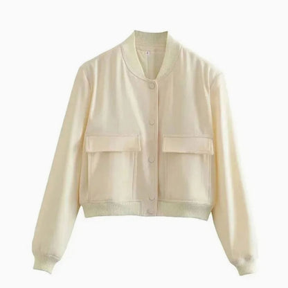 Women's faux-leather bomber jacket by Homixa featuring snap buttons, two patch pockets, and a ribbed collar.