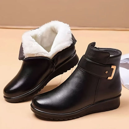 Homixa women's faux-leather fleece-lined booties with buckle accent and side zip for stylish winter footwear.