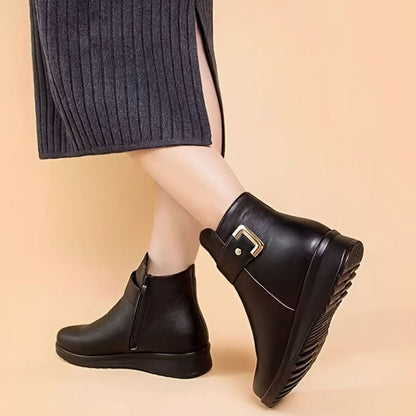 Homixa women's faux-leather fleece-lined booties with buckle accent and side zipper, stylish winter footwear for women.