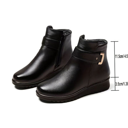 Homixa women's faux-leather fleece-lined booties with buckle accent and side zipper for warm, stylish winter footwear.
