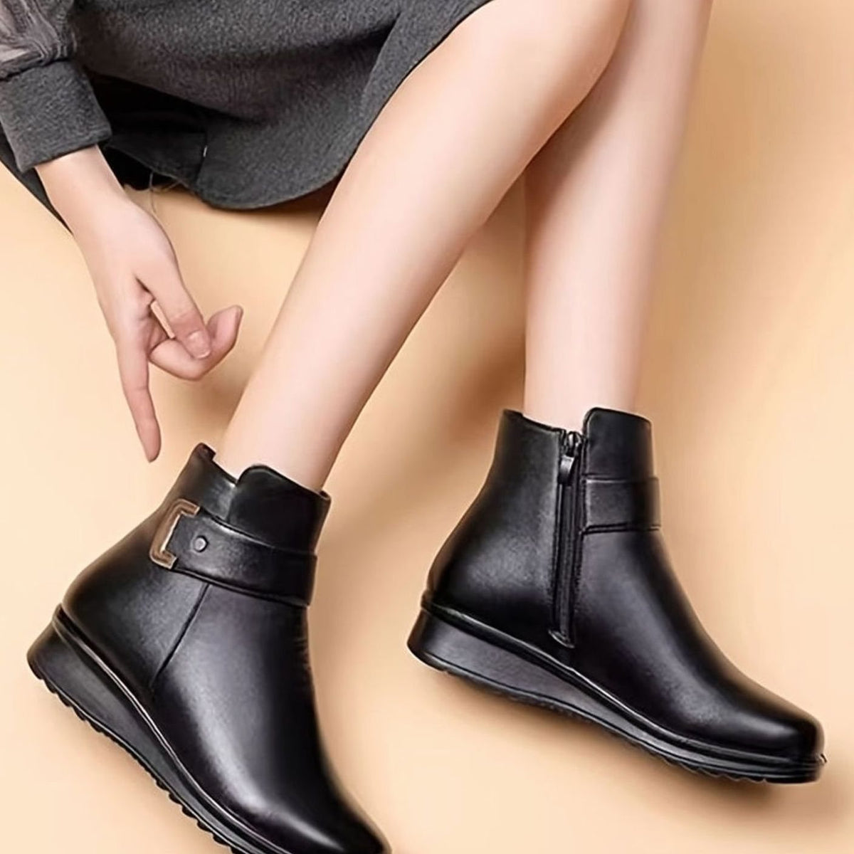 Homixa women's fleece-lined faux-leather booties with buckle accent and side zipper, stylish winter ankle boots.