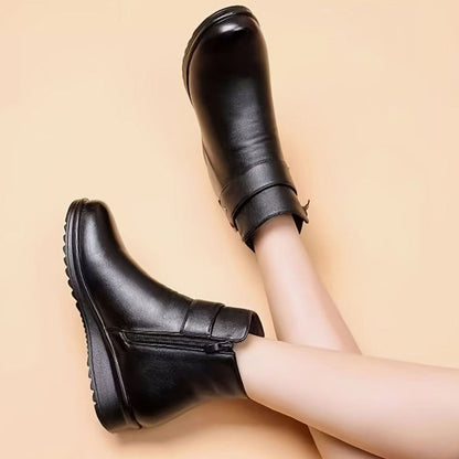 Homixa women's faux-leather fleece-lined booties with buckle accent and side zipper, stylish and cozy for cold weather.