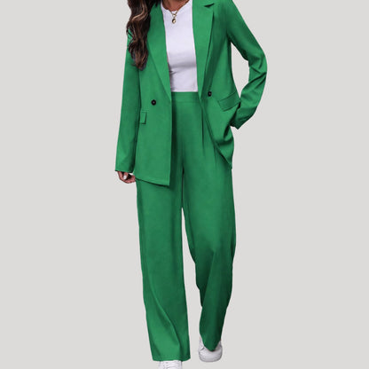Women's fitted double-breasted tailored pantsuit with blazer and matching pants by Homixa, shown on a model.