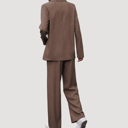 Women's fitted double-breasted tailored pantsuit with blazer and pants by Homixa, styled for a polished professional look.