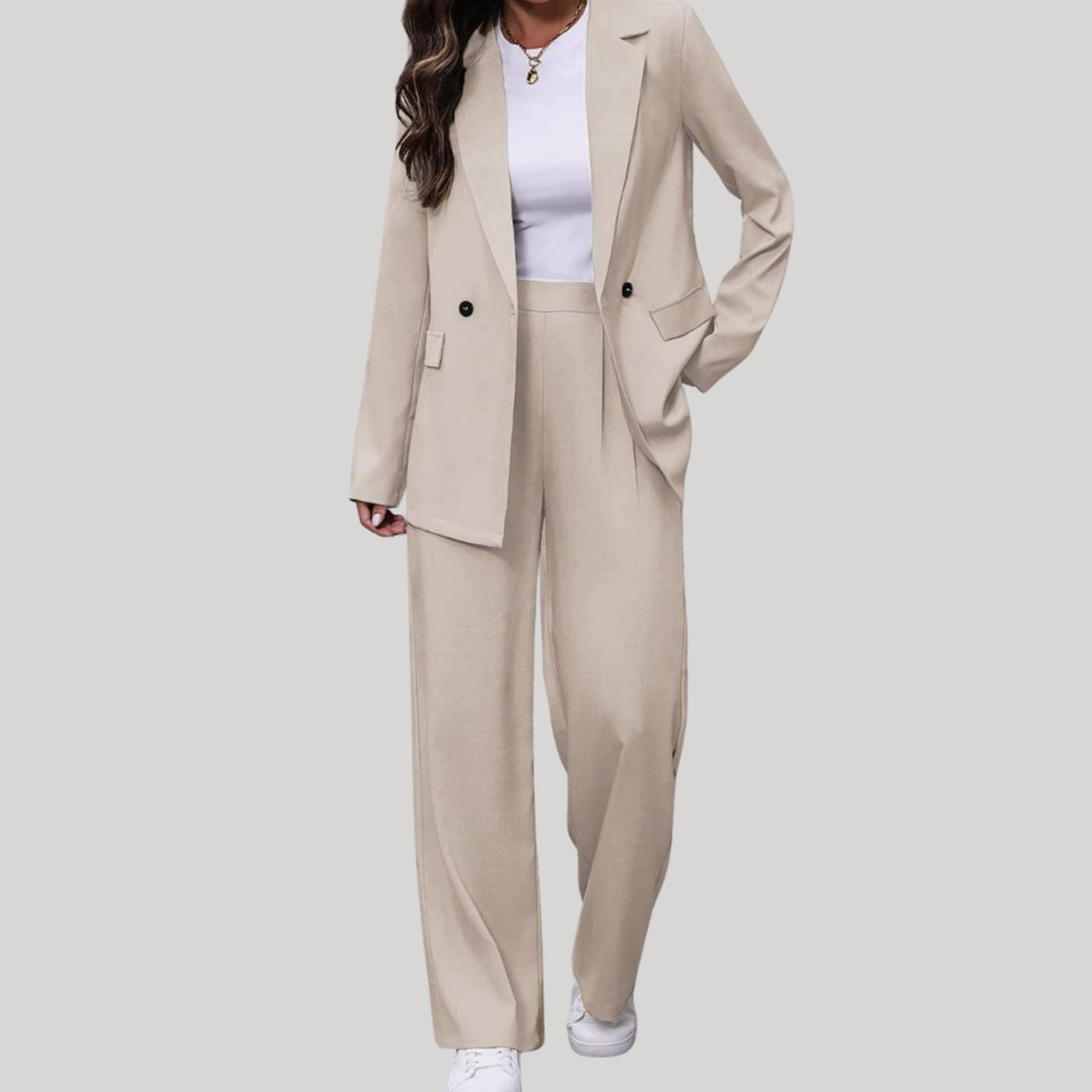 Women's fitted double-breasted tailored pantsuit with blazer and pants by Homixa, showcasing a sleek professional outfit.