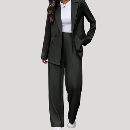 Women's fitted double-breasted tailored pantsuit with blazer and pants by Homixa, shown on a model in a professional setting.