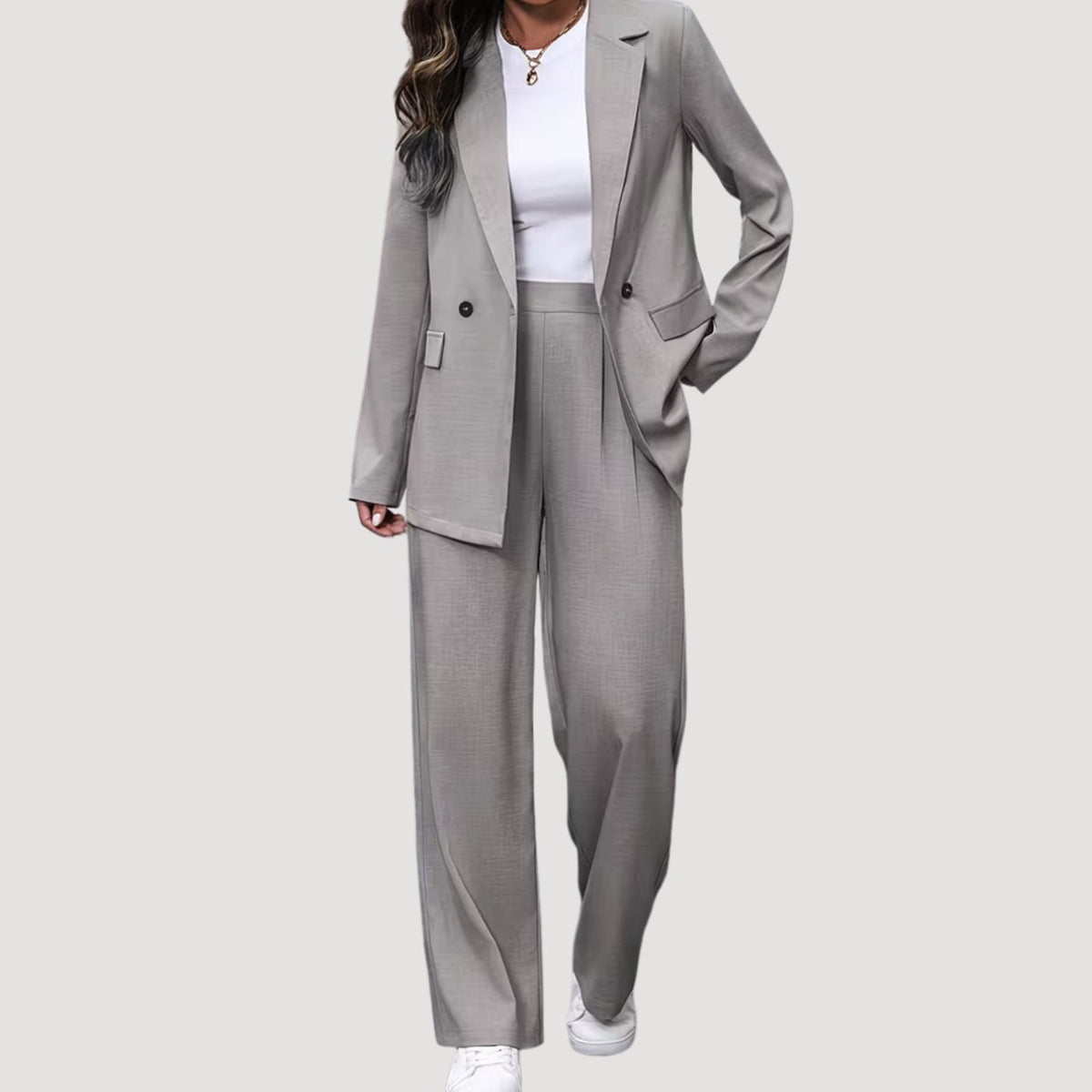 Women's fitted double-breasted tailored pantsuit with blazer and pants, stylish and professional Homixa fashion ensemble.