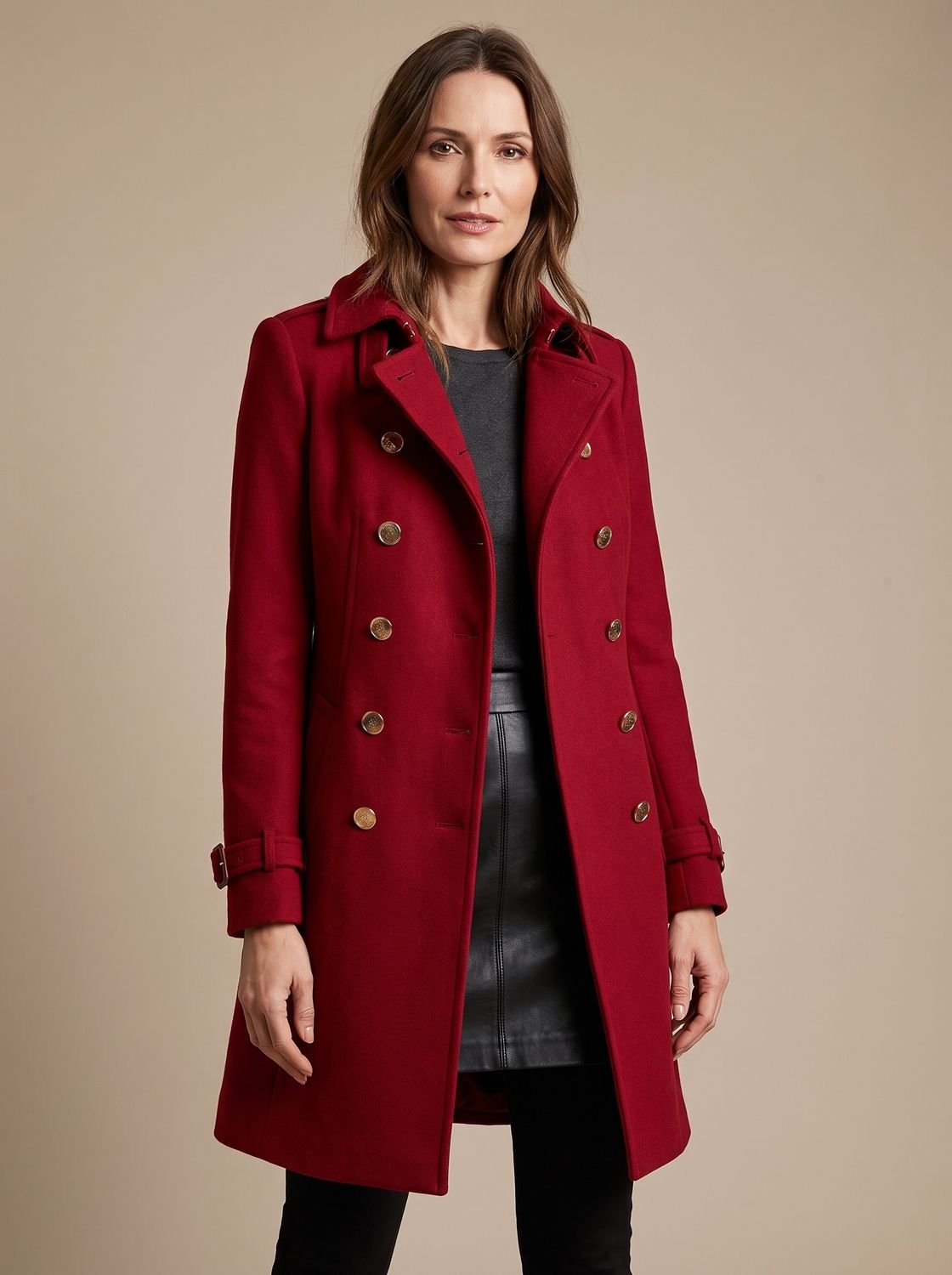 Women's fitted double-breasted wool coat by Homixa with lapel collar and gold buttons, showcasing a stylish winter outerwear.