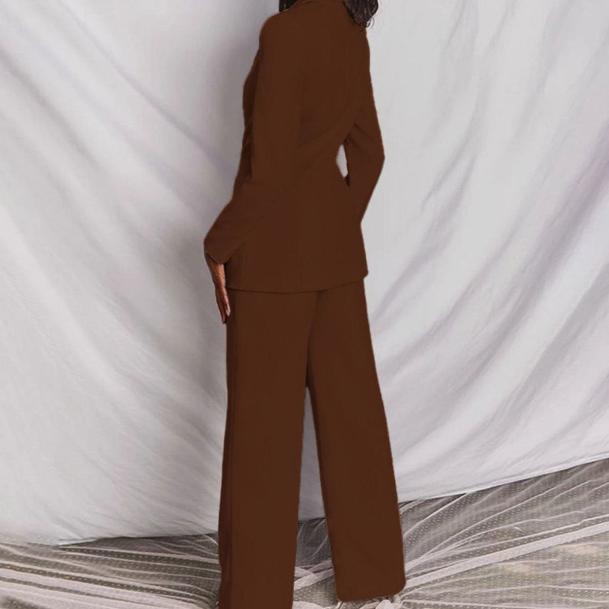 Women's fitted tailored pantsuit with one-button blazer and wide-leg pants, stylish Homixa business outfit.